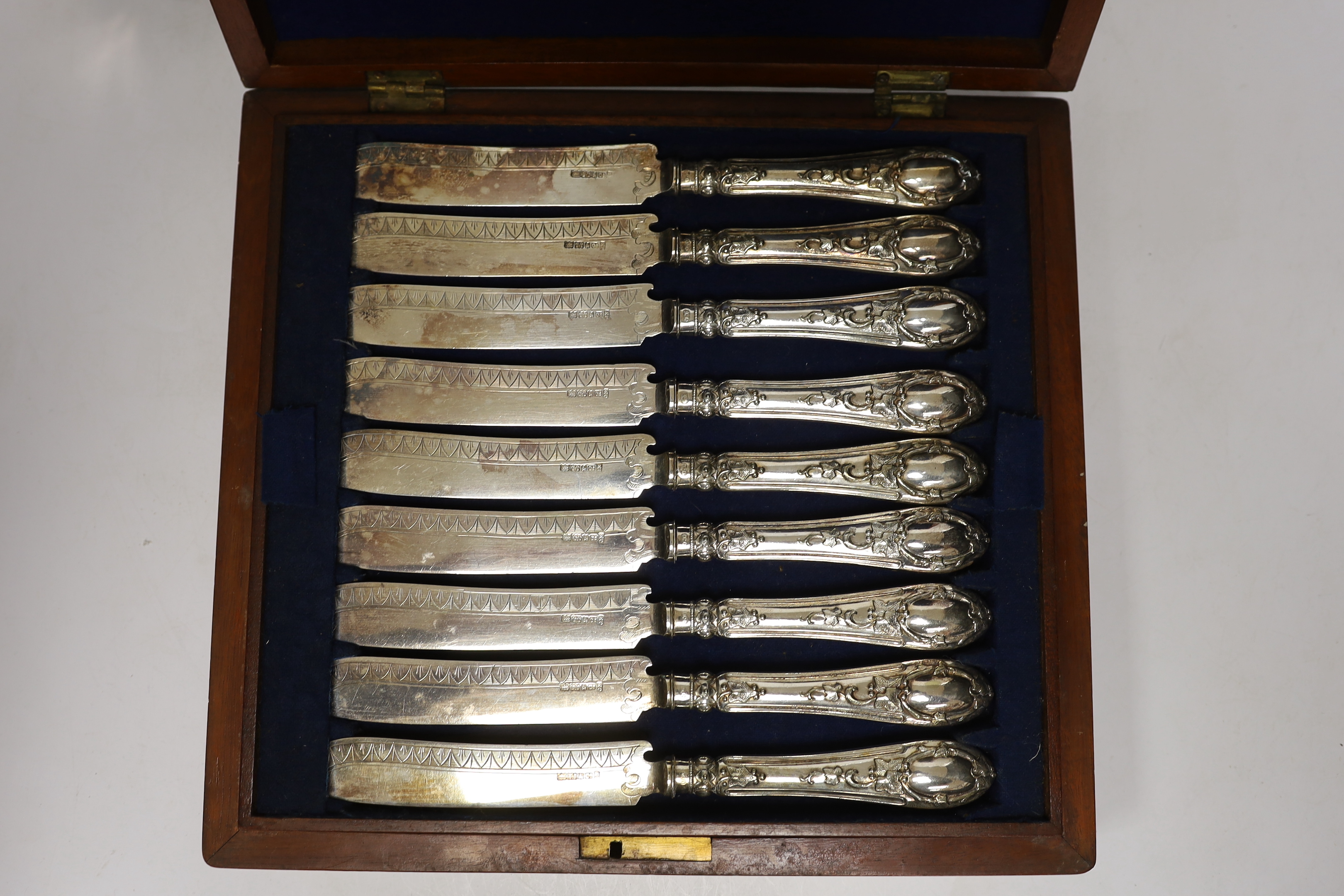 Assorted plated ware including a cased set of dessert knives, egg coddler, caddy, mug etc.